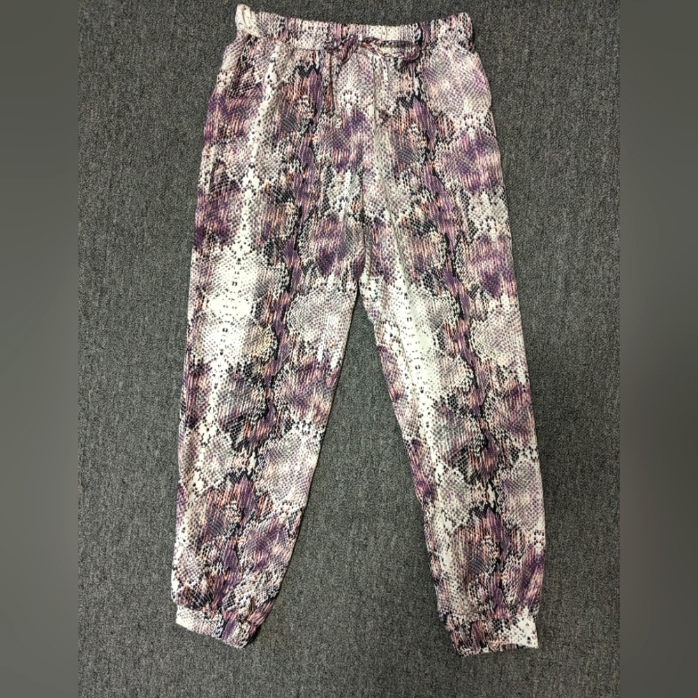 Jennifer Lopez snakeskin print pants